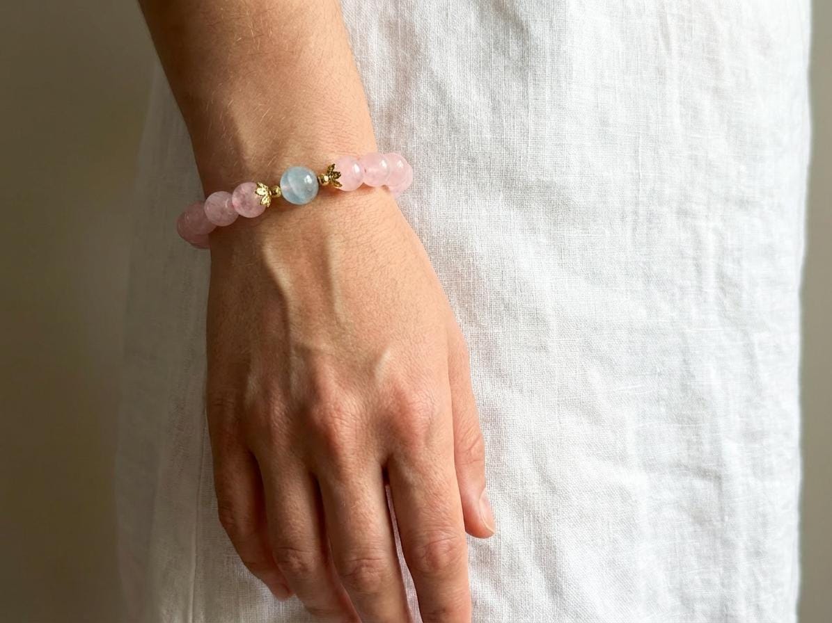 KAGAKI rose quartz blue accent bracelet in soft pink rose quartz with blue accents, bead detail, for meditation and daily intention
