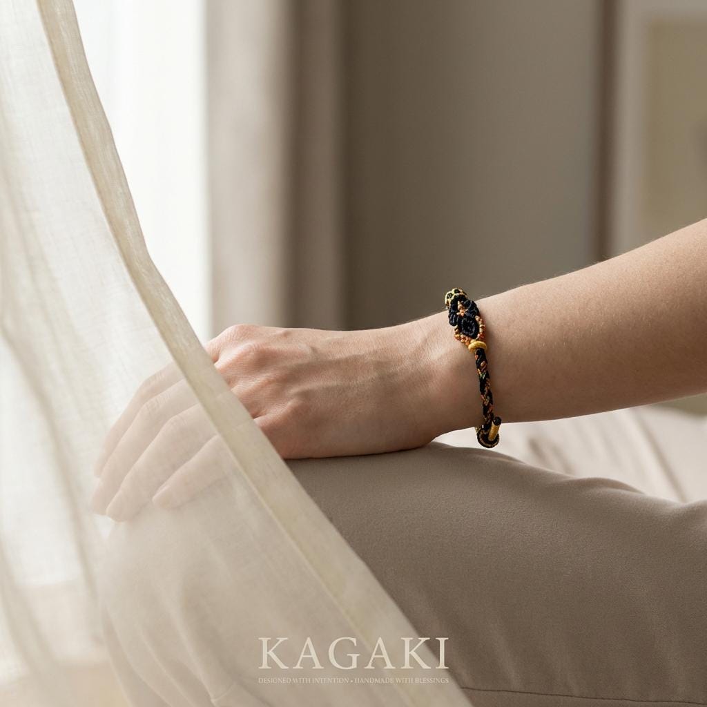 KAGAKI Tibetan meditation protection bracelet in deep black handwoven cord with gold-tone accent, color variation showcase, for grounding and daily intention