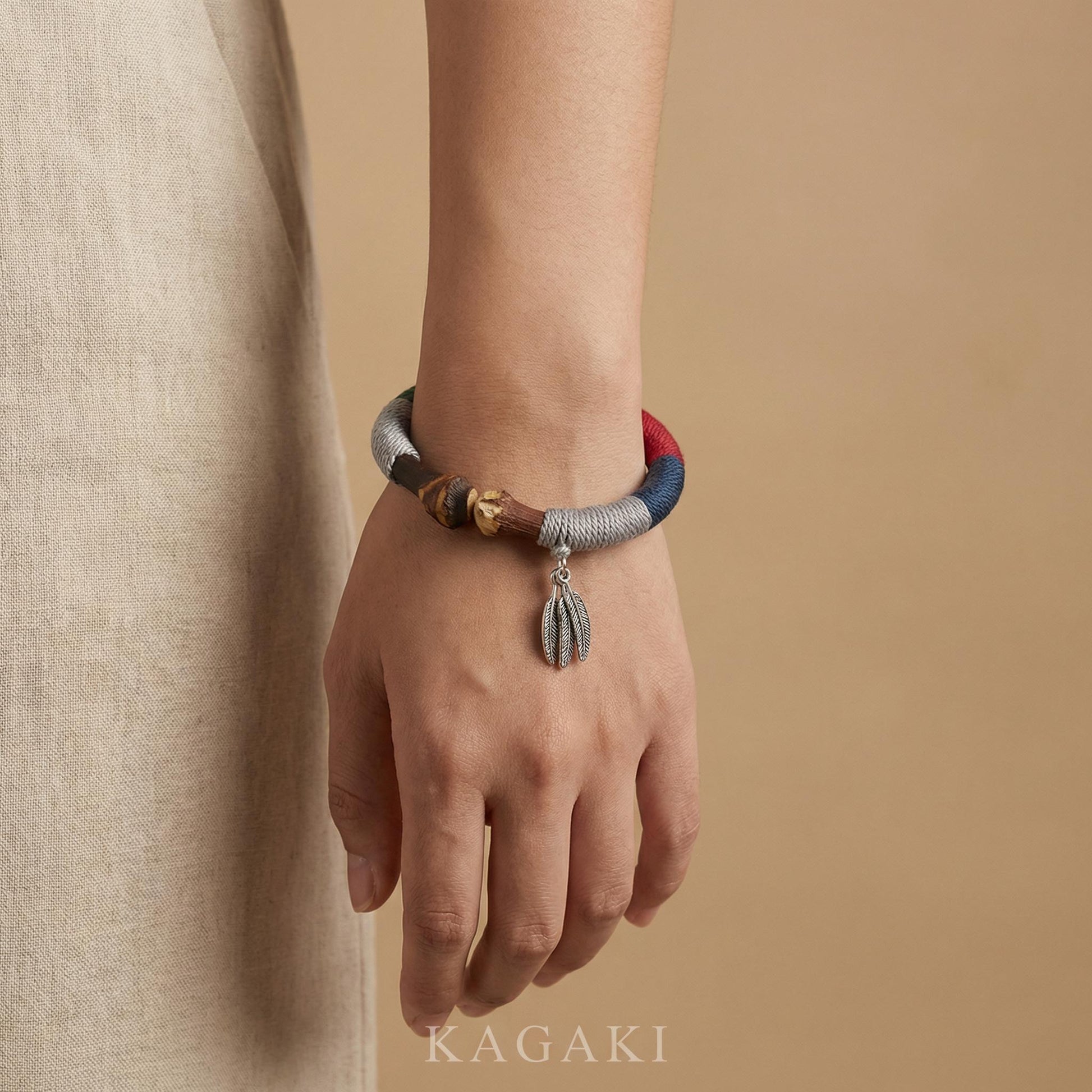 KAGAKI tibetan wood fiber cord bracelet in natural wood tones, alternate angle, for meditation and daily intention