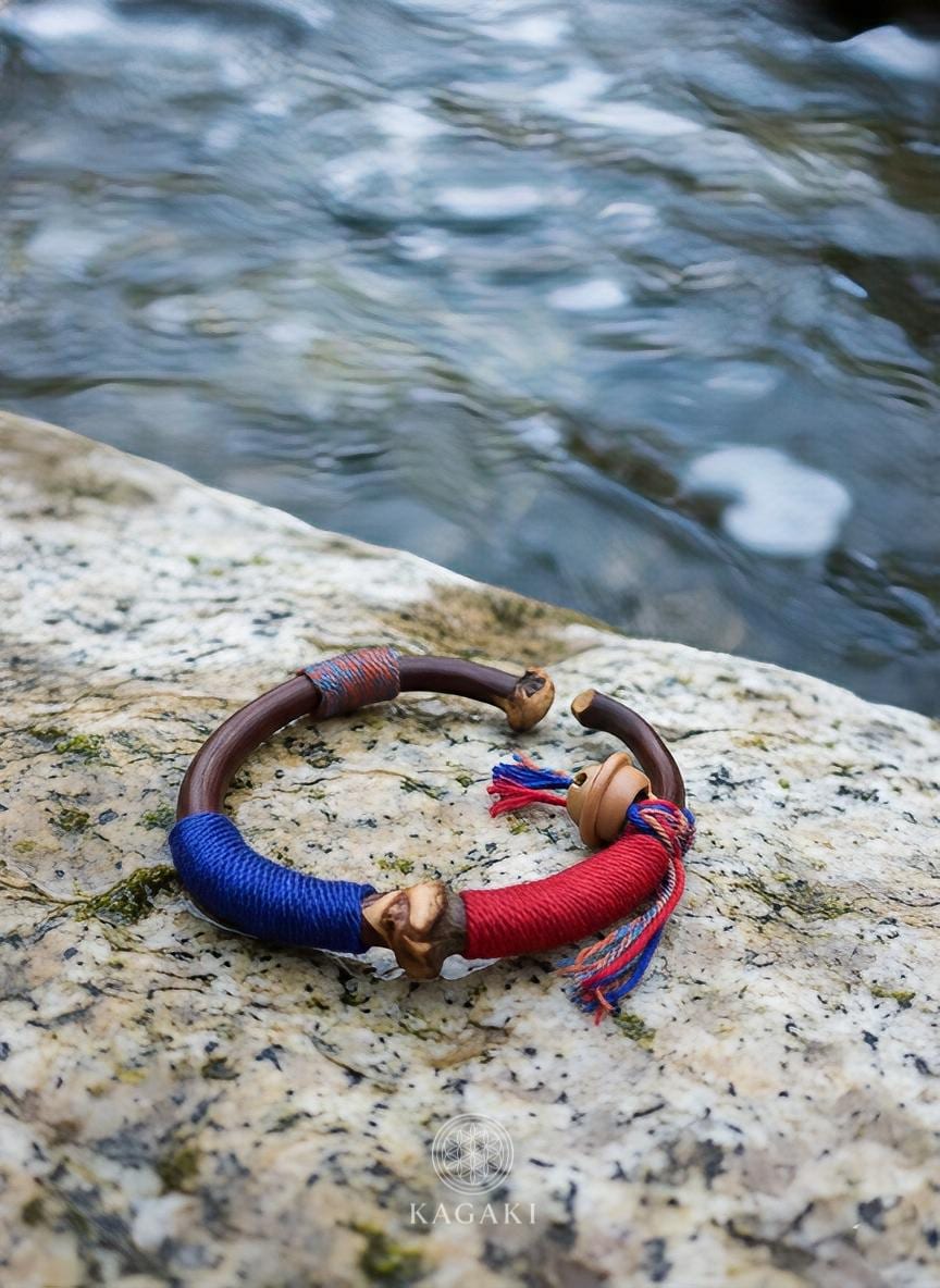 KAGAKI tibetan wood fiber cord bracelet in natural wood tones, flat lay, for meditation and daily intention