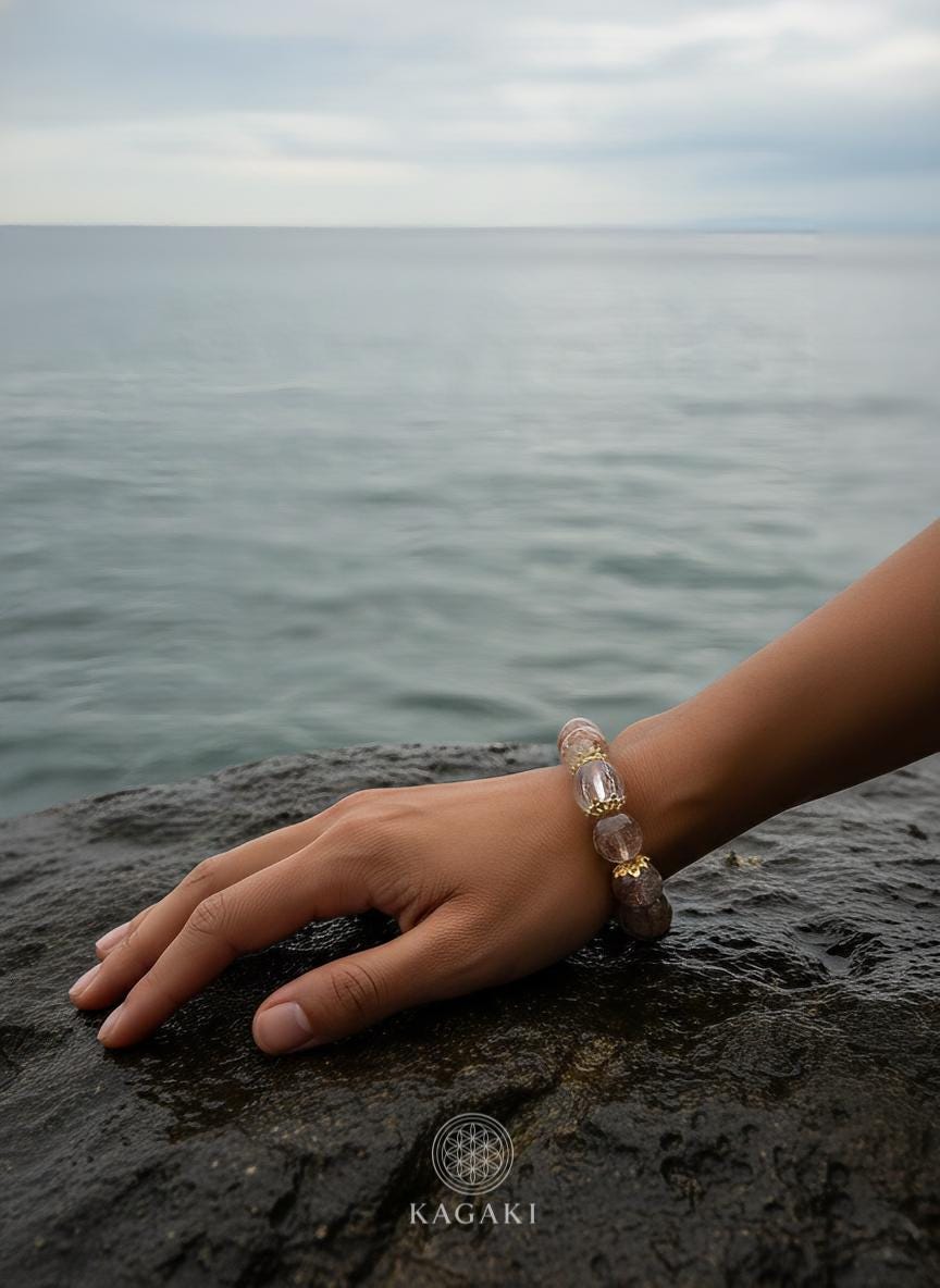 KAGAKI tourmalinated quartz bracelet in clear quartz with black tourmaline inclusions, scale on hand, for meditation and daily intention